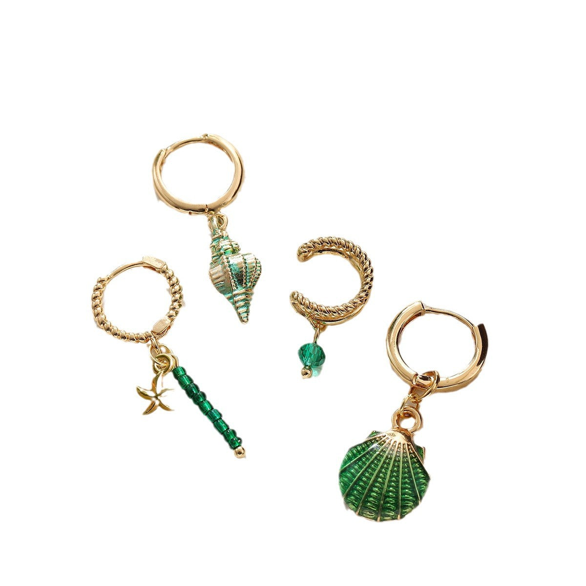 4 piece of niva earrings and ear studs