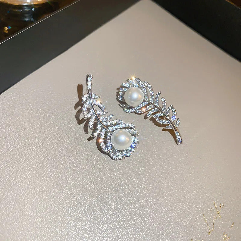 white noora leaf earrings