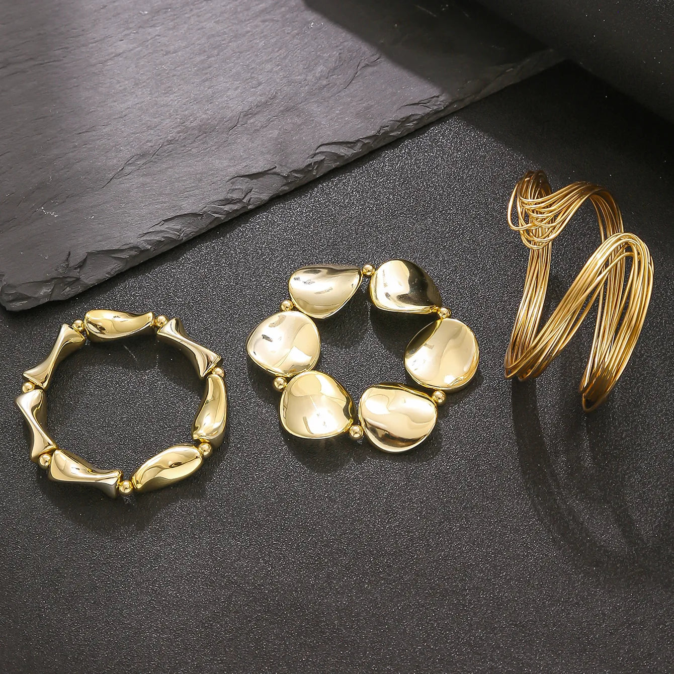 Exaggerated Style pair of 3 bracelets