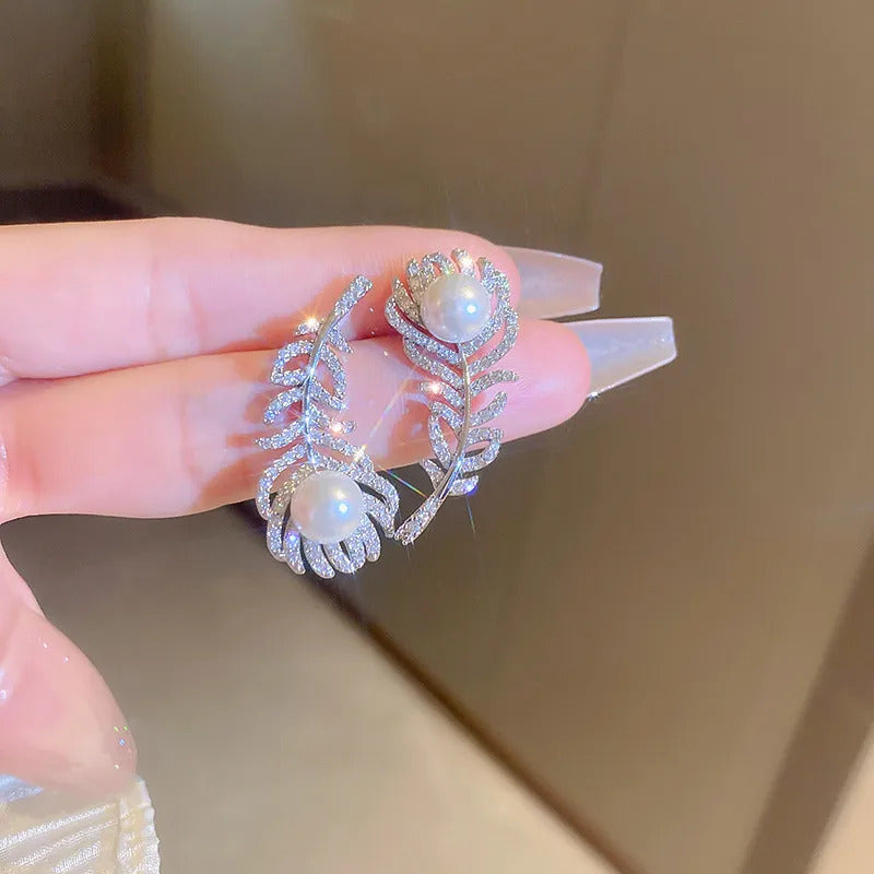 white noora leaf earrings