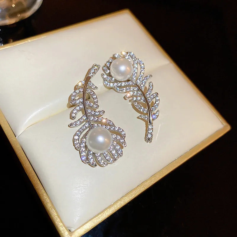 white noora leaf earrings